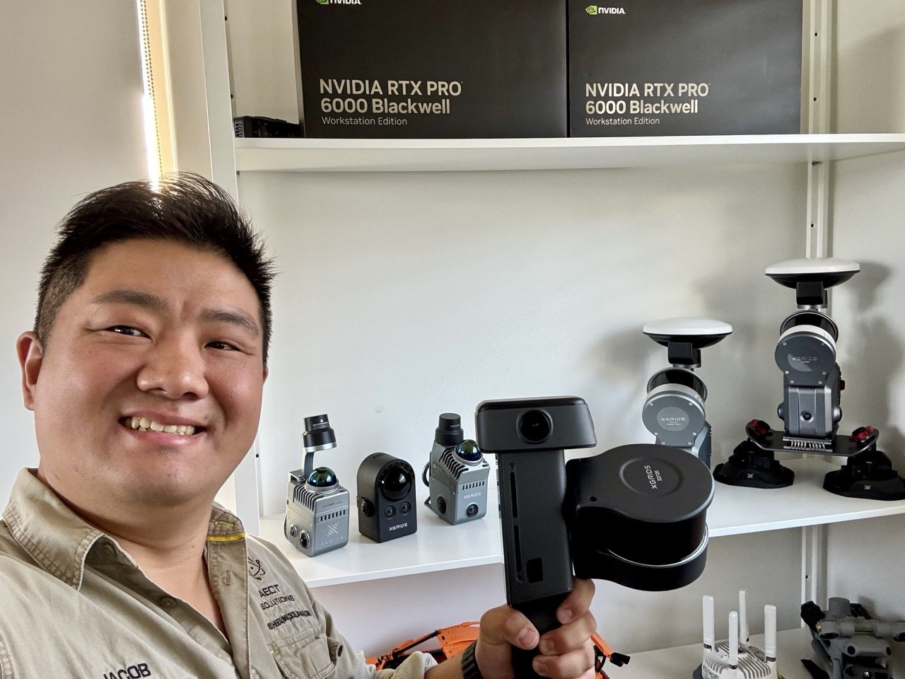 Jacob Lee scanning on site with an XGRIDS handheld SLAM scanner