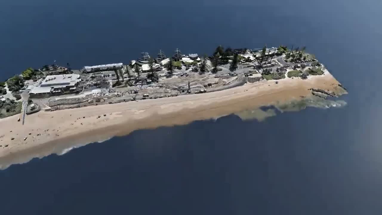One seamless model — aerial context and ground detail fused (Mooloolaba seawall)