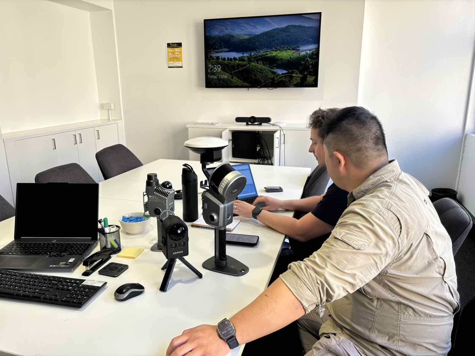 Equipment setup session with capture hardware and an RTK pole