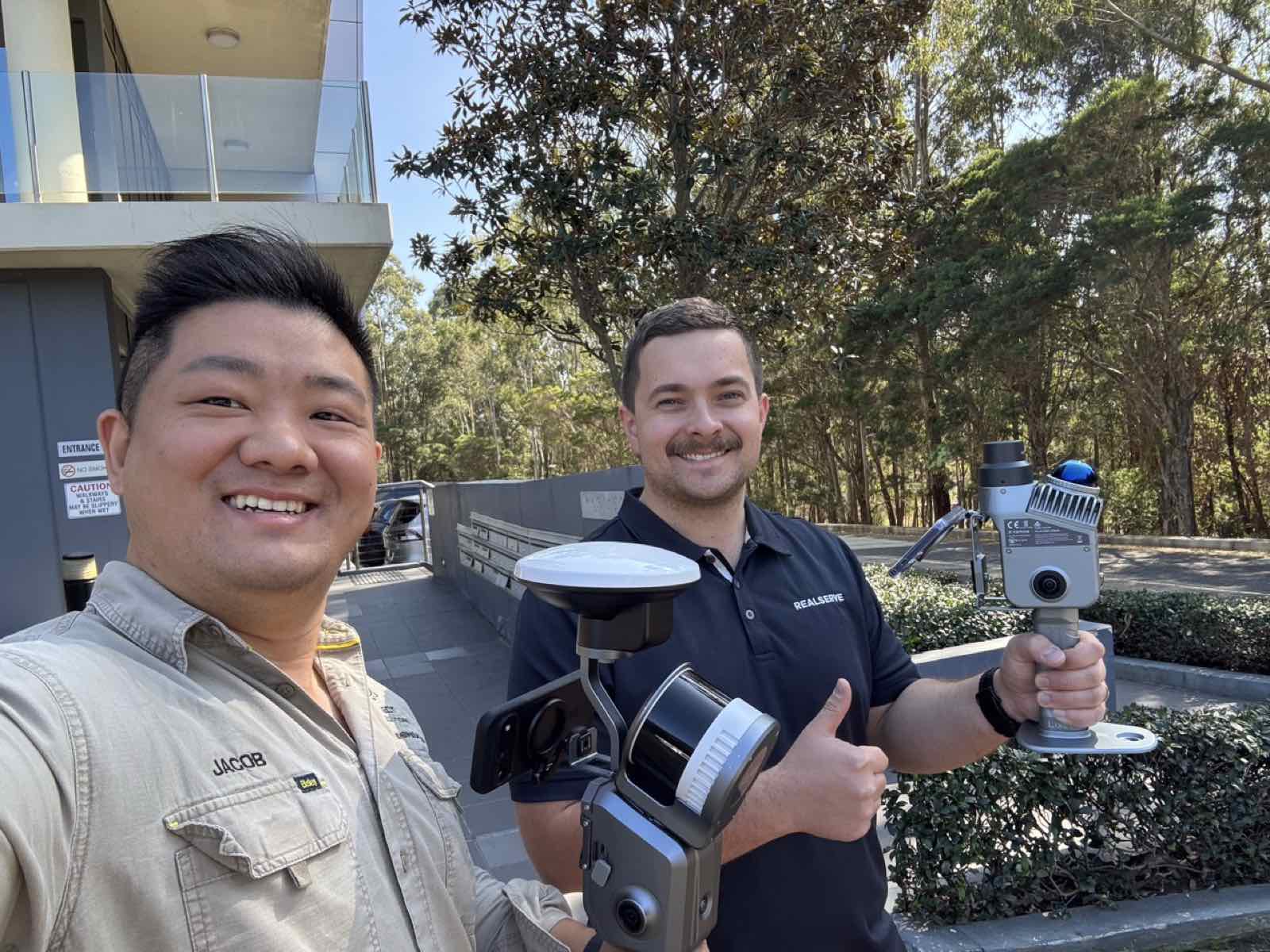 AECT team in the field with a handheld scanner