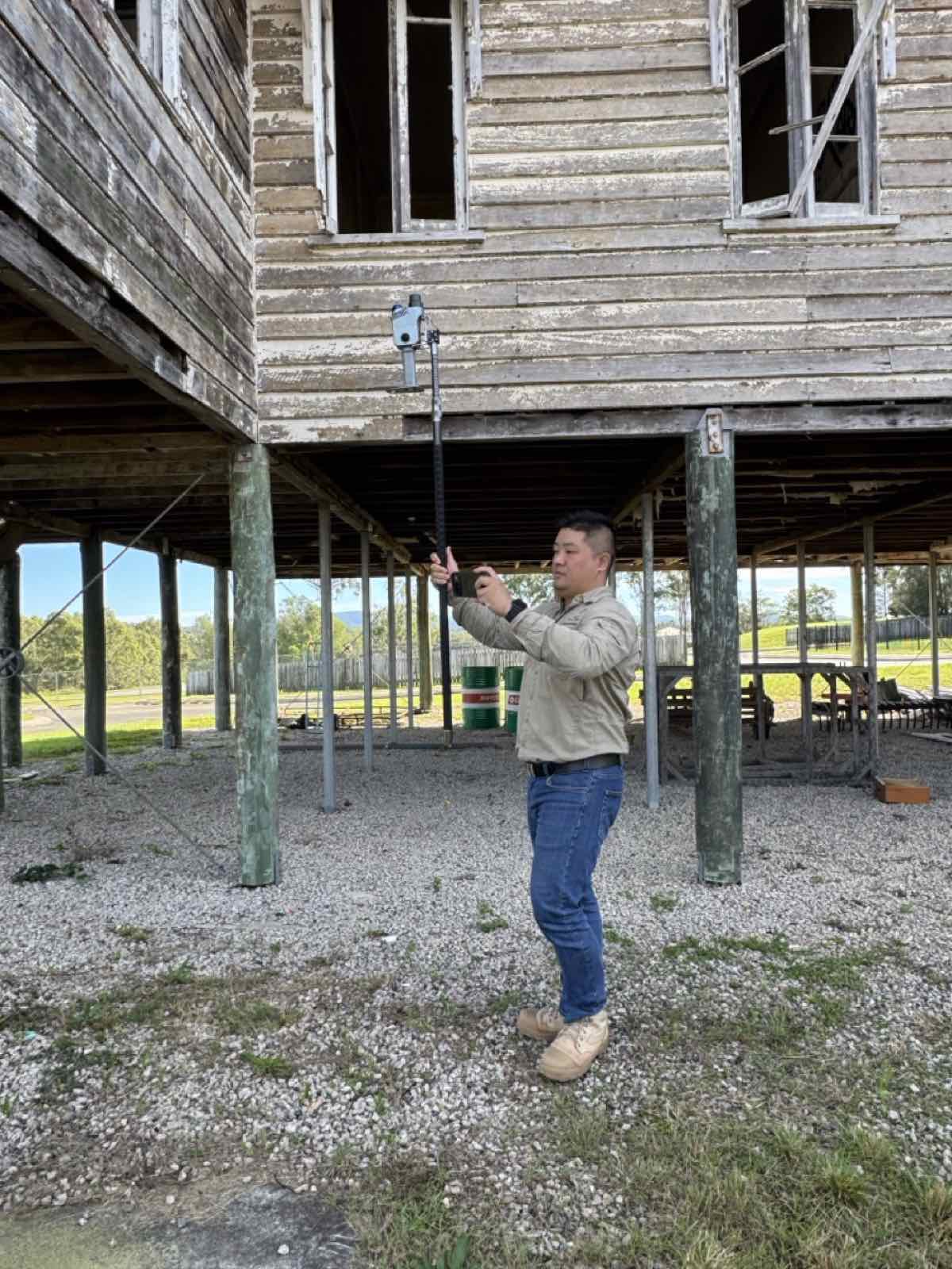 Pole-mounted scanning beneath a heritage timber structure